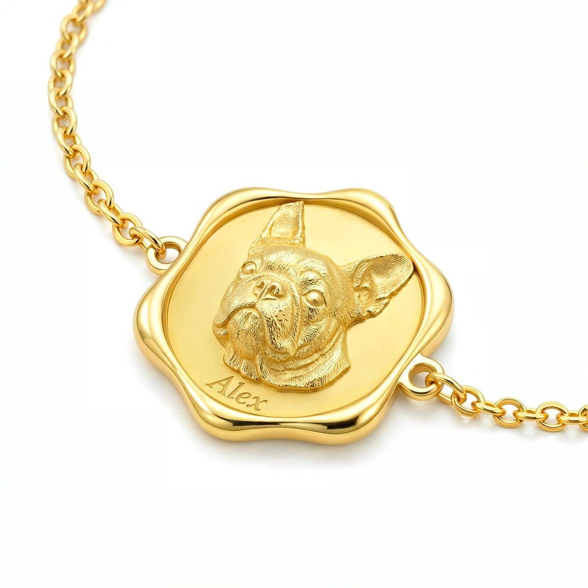 Angled close-up of the bracelet medallion and its engraving #chain